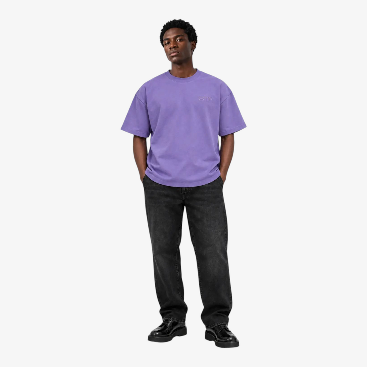 Male model wearing STF lavender tonal embroidered T-shirt front view
