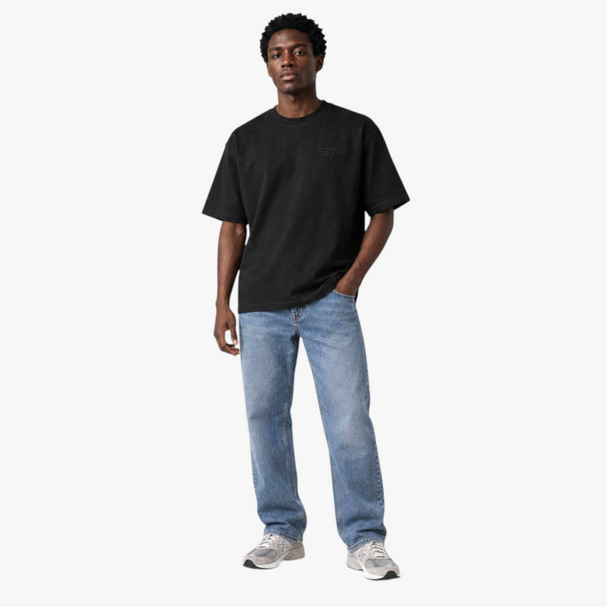 Male model wearing STF black tonal embroidered T-shirt front view