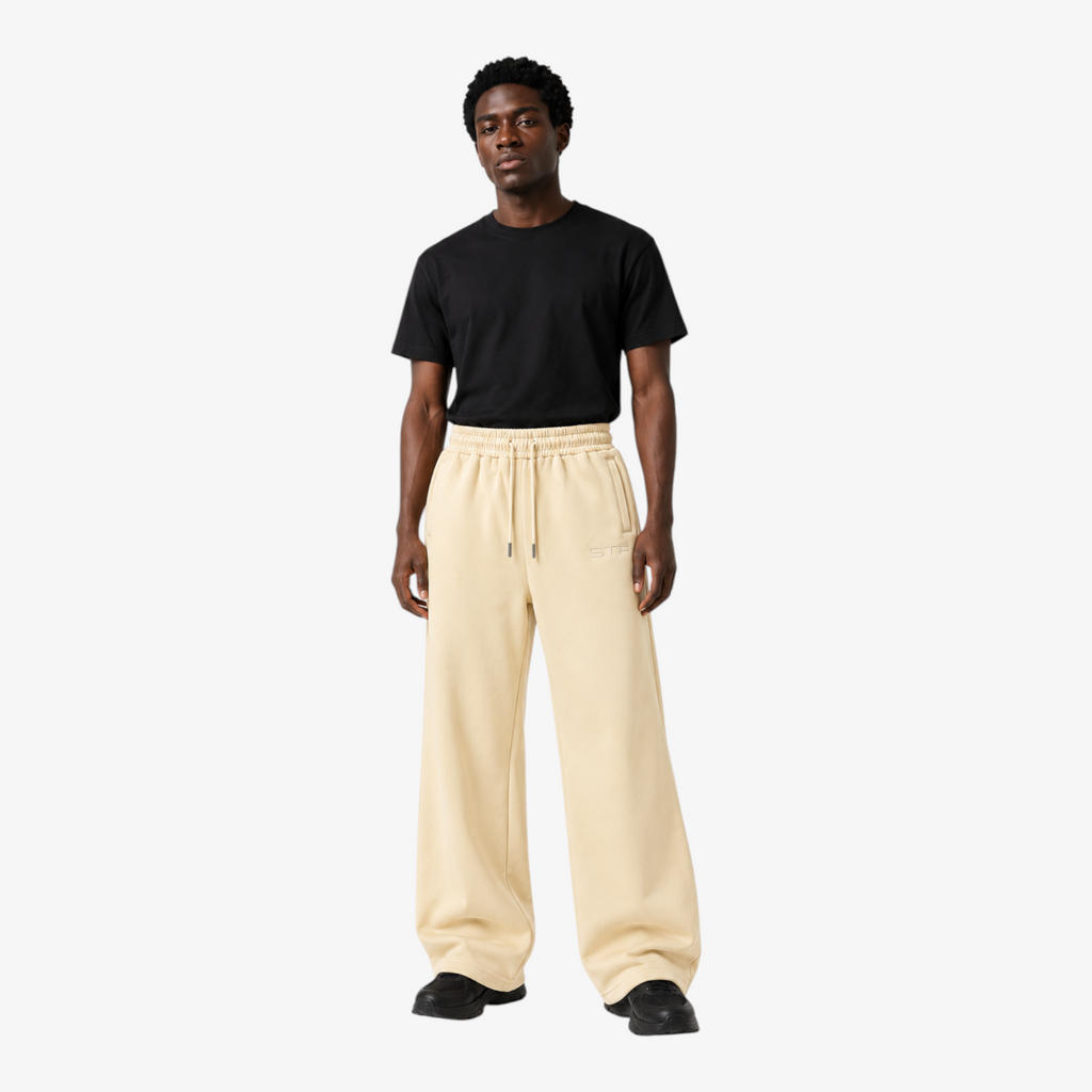 STF cream oversized wide-leg joggers — male model front