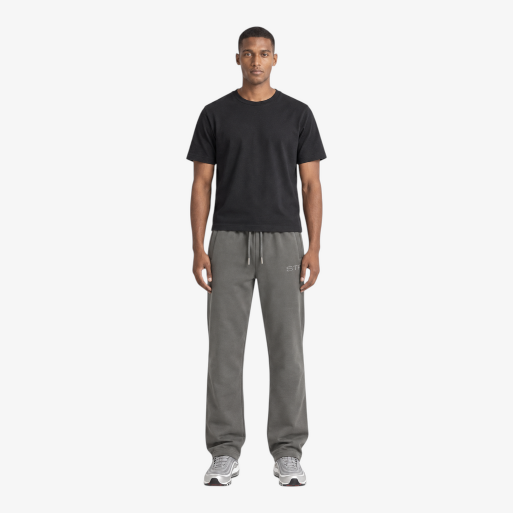 STF grey relaxed open-hem trousers — male front view