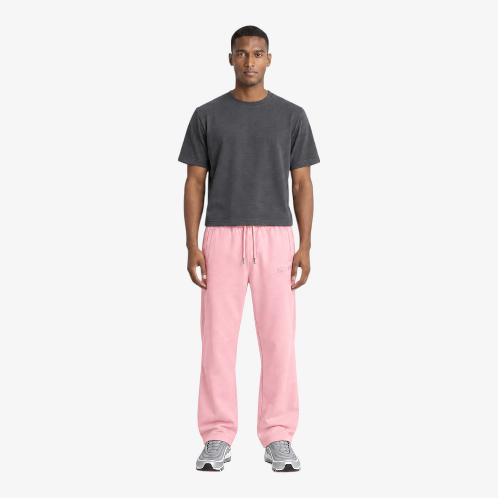 STF relaxed open-hem trousers in pink — Male model front