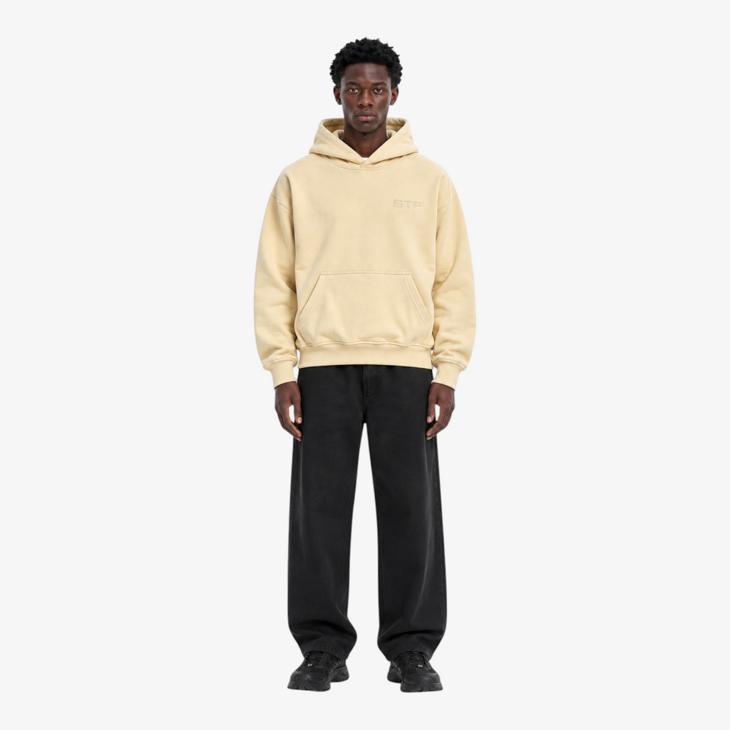 STF oversized boxy hoodie in cream — Male model front view