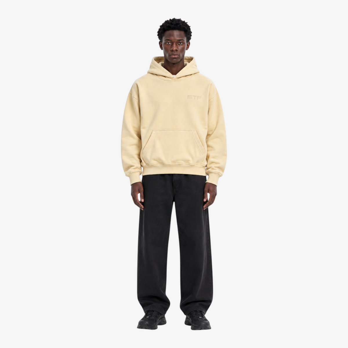 STF oversized boxy hoodie in cream — Male model front view