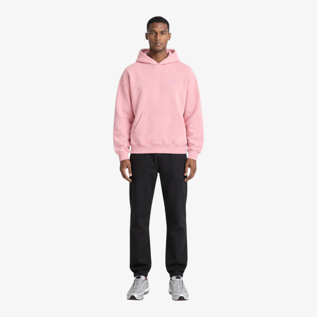 STF pink oversized boxy hoodie — male model front