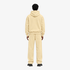 STF oversized boxy cream hoodie and trouser set — Male model back
