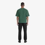 Male model wearing STF forest green flame T-shirt back