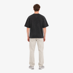 STF Unseen Form washed-black oversized T-shirt — male back