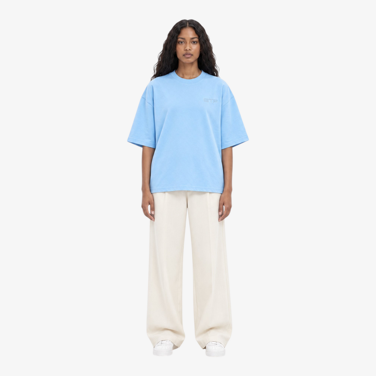Female model wearing STF sky blue tonal embroidered T-shirt front