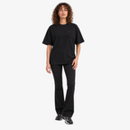 Female model wearing STF black tonal embroidered T-shirt front view