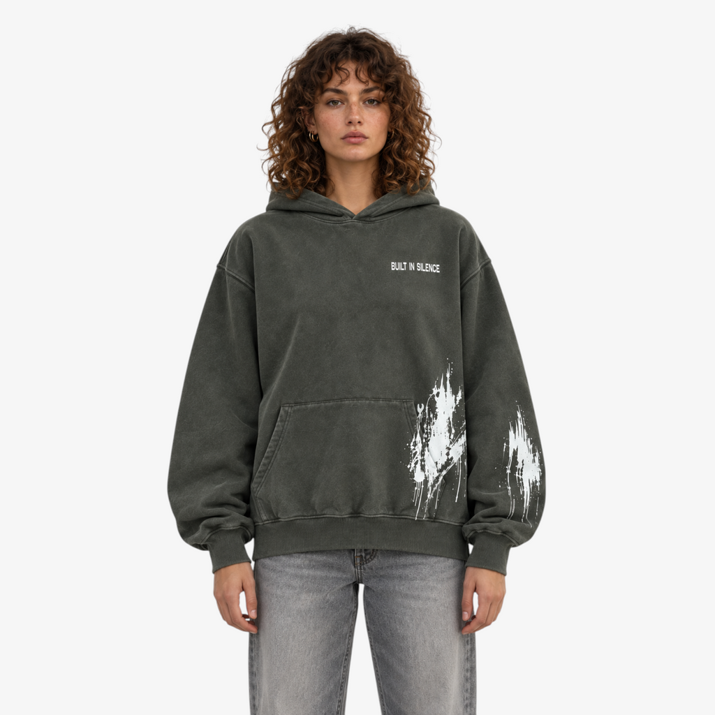 STF Built in Silence boxy oversized hoodie in washed olive-charcoal — female front