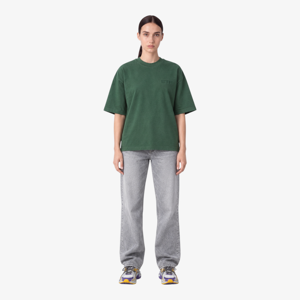Female model wearing STF forest-green tonal embroidered T-shirt front view