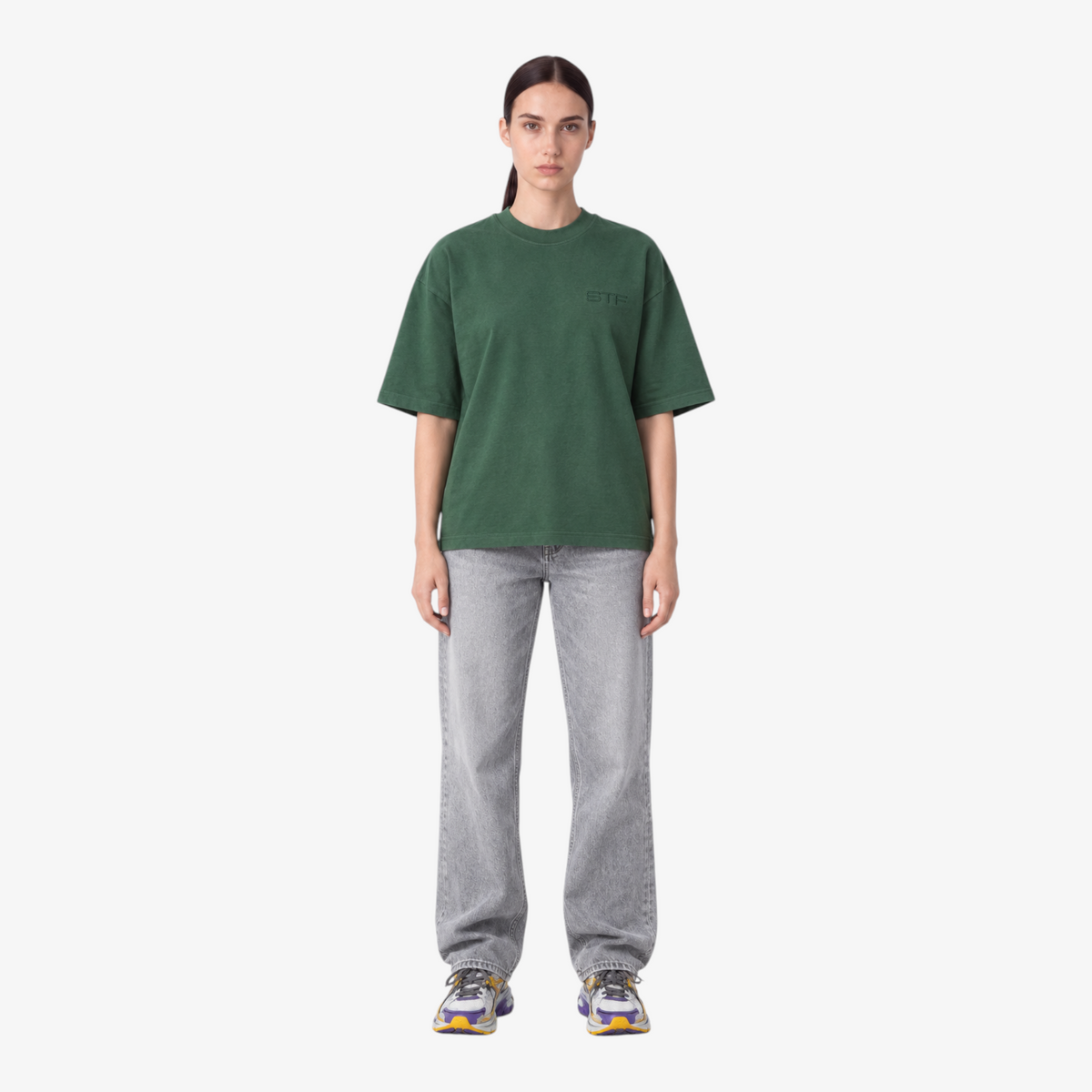 Female model wearing STF forest-green tonal embroidered T-shirt front view