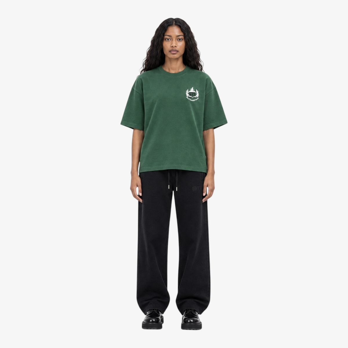 Female model wearing STF forest green flame T-shirt front