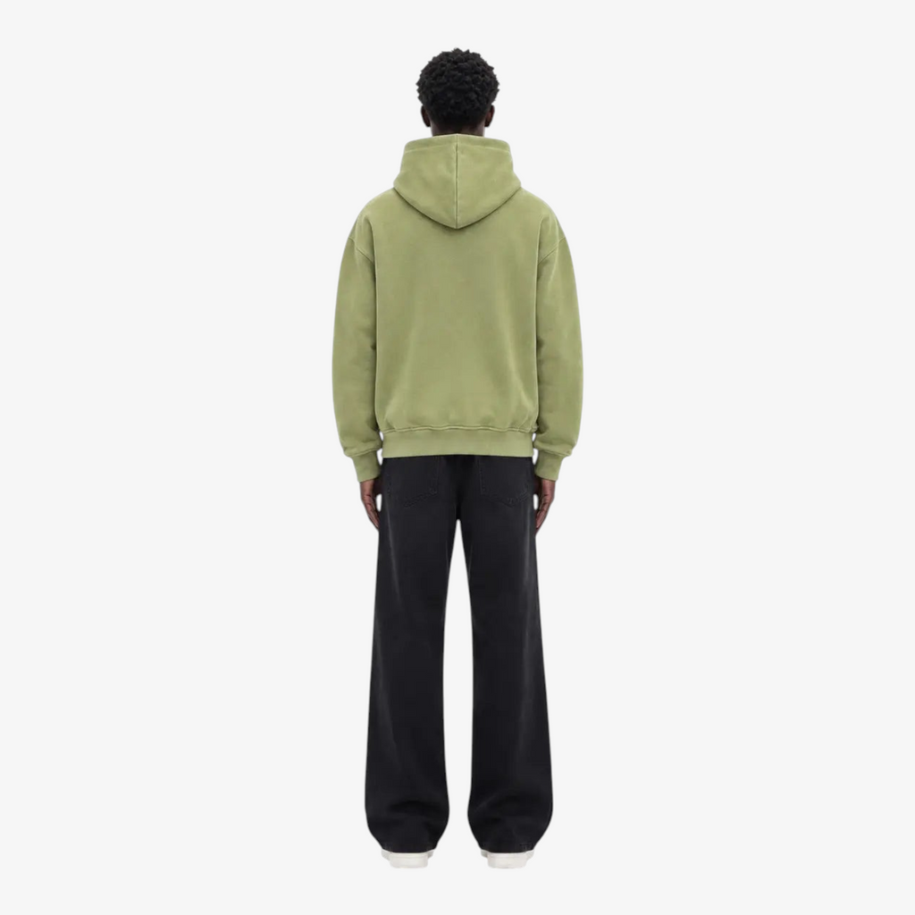 Model wearing STF oversized olive hoodie back view