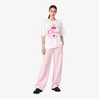 STF Olivia white oversized T-shirt with pink crown and heart graphic — model three-quarter front
