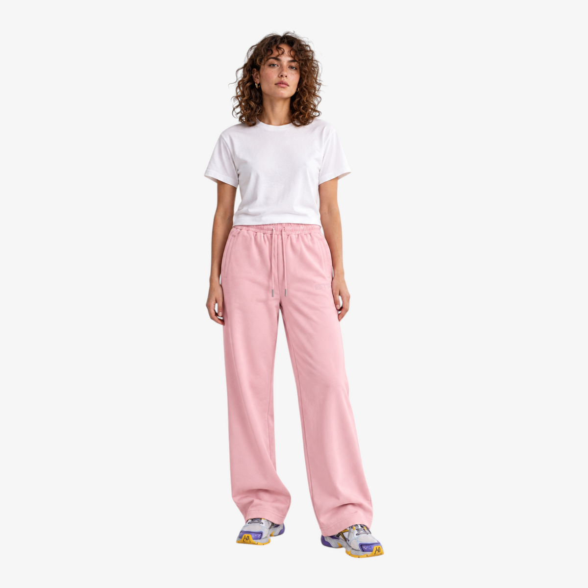 STF relaxed open-hem trousers in pink — Female model front