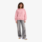 STF pink oversized boxy hoodie — female model front