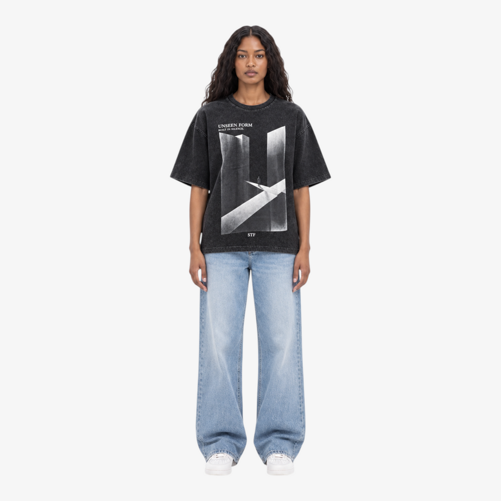 STF Unseen Form washed-black oversized T-shirt — female front