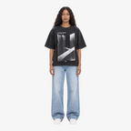 STF Unseen Form washed-black oversized T-shirt — female front