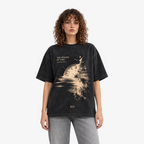 STF Weight of Time washed black boxy oversized T-shirt — female front view