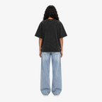 STF Motion in Stillness washed-black boxy oversized T-shirt — female back