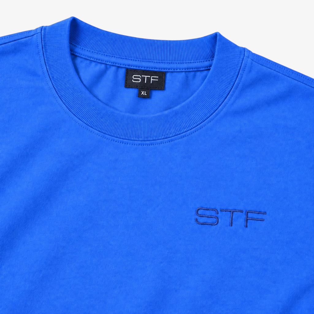 STF royal blue T-shirt collar label and tonal chest embroidery detail