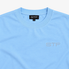 STF sky blue T-shirt collar label and tonal chest embroidery detail