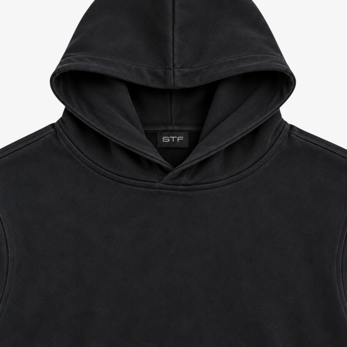 STF Black Oversized Hoodie – hood and neck label detail