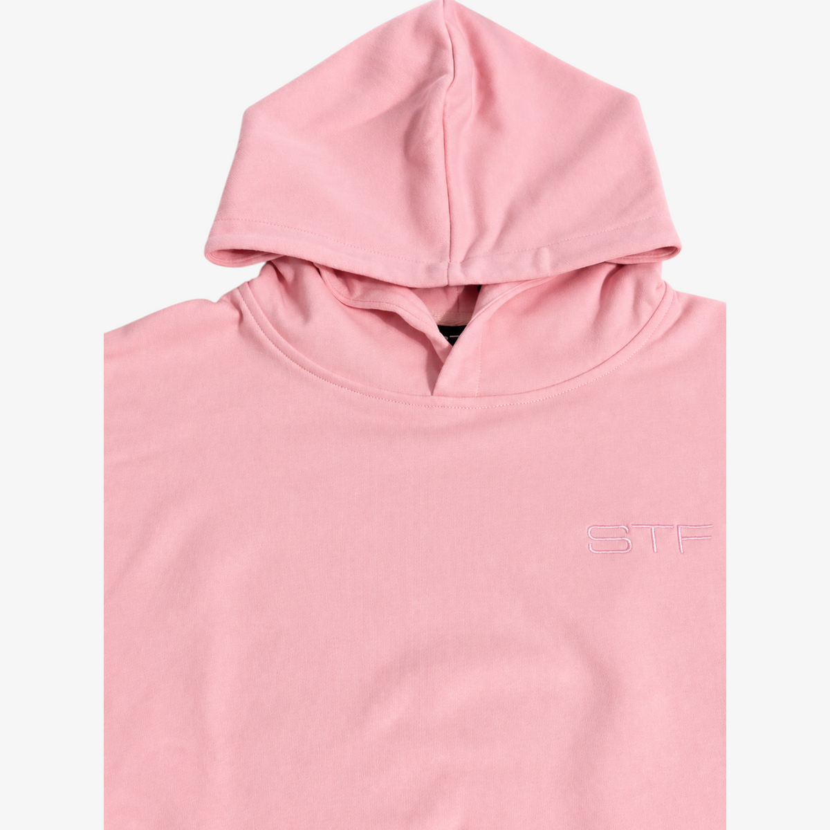 STF pink oversized boxy hoodie — hood and STF embroidery detail