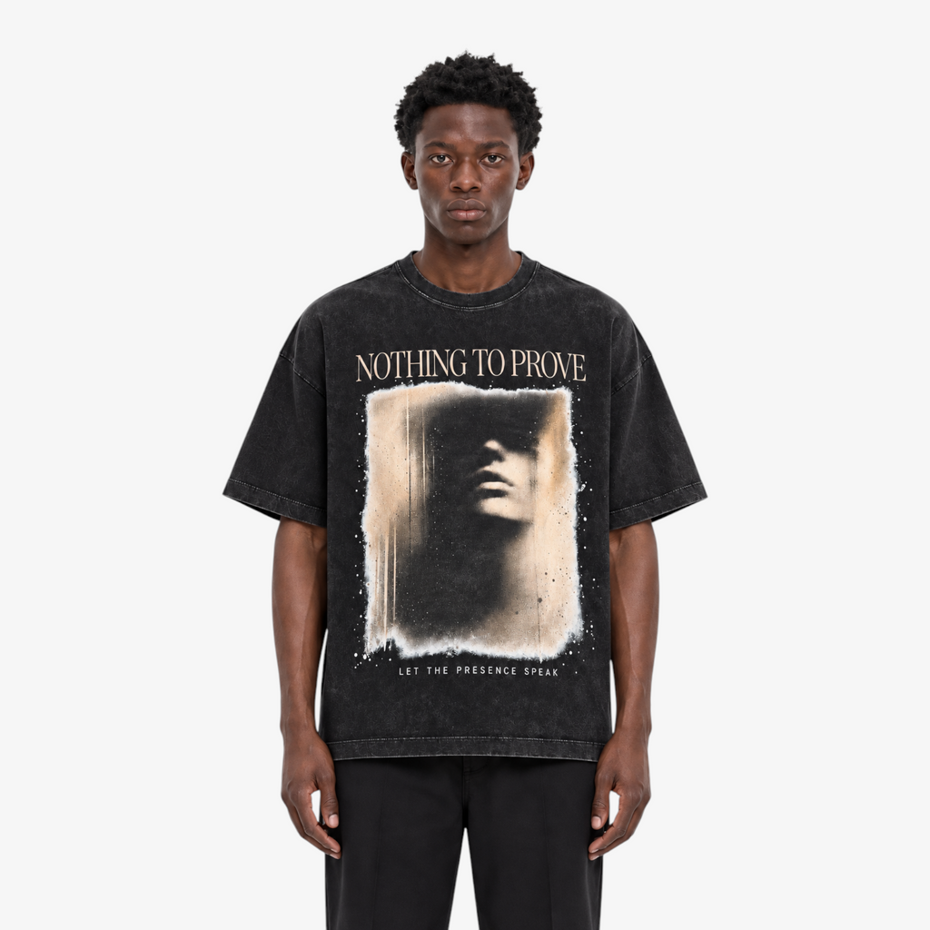 STF Nothing to Prove washed black boxy oversized T-shirt — male front closeup