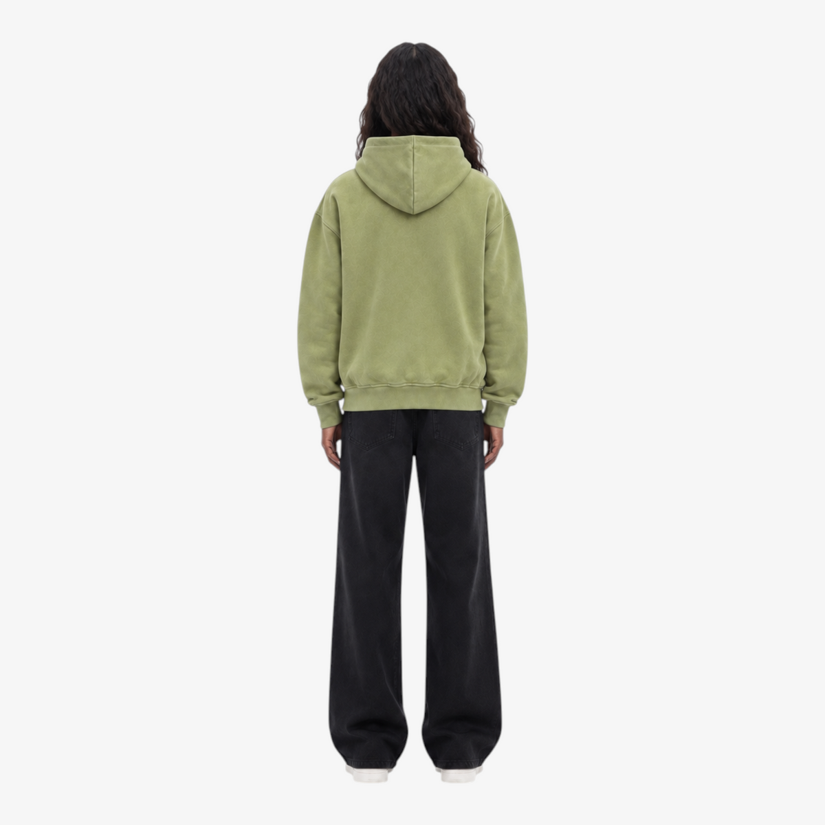 Female model wearing STF oversized olive unisex hoodie back view