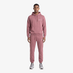 Model wearing a Seejthreadsflames (STF) mauve heavyweight cotton tracksuit with oversized hoodie and relaxed joggers.
