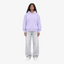 Model wearing a Seejthreadsflames (STF) lavender pullover hoodie with chest embroidery, paired with light wash jeans.